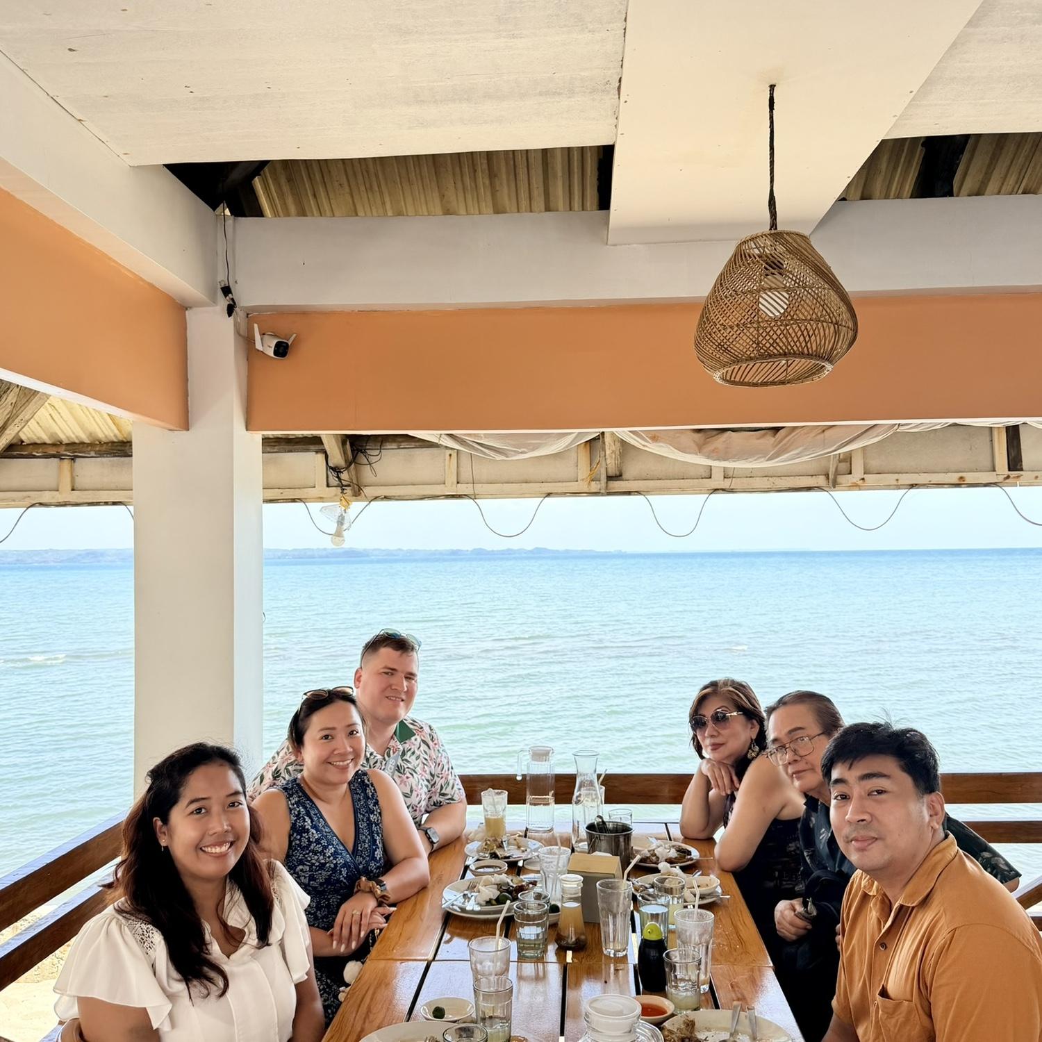 Nate trying Ilonggo cuisine with Sam’s family
