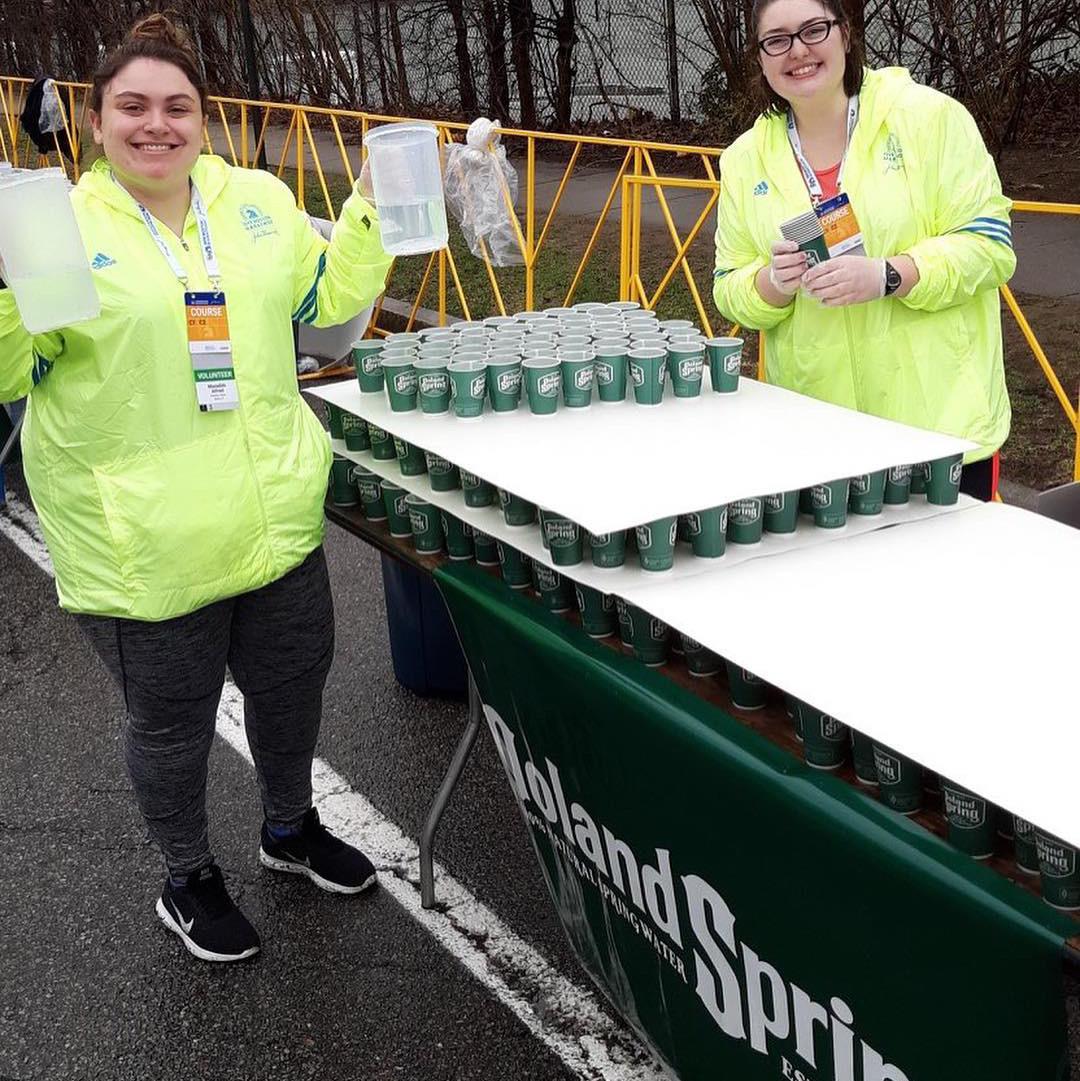 April 2019: Volunteering at the Boston marathon together.