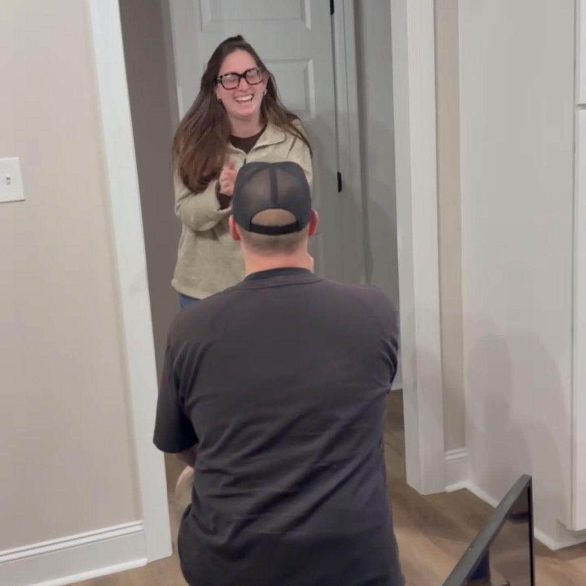 The moment he popped the question in our new home!
