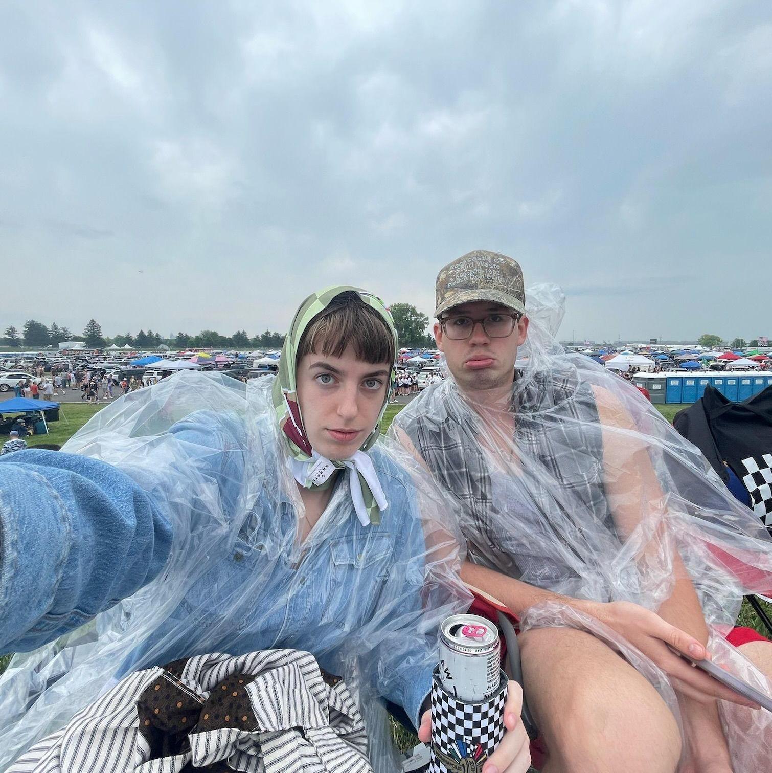 John-Luc and Grace hunkering down during the rain delay at the 108th Running of the Indianapolis 500.