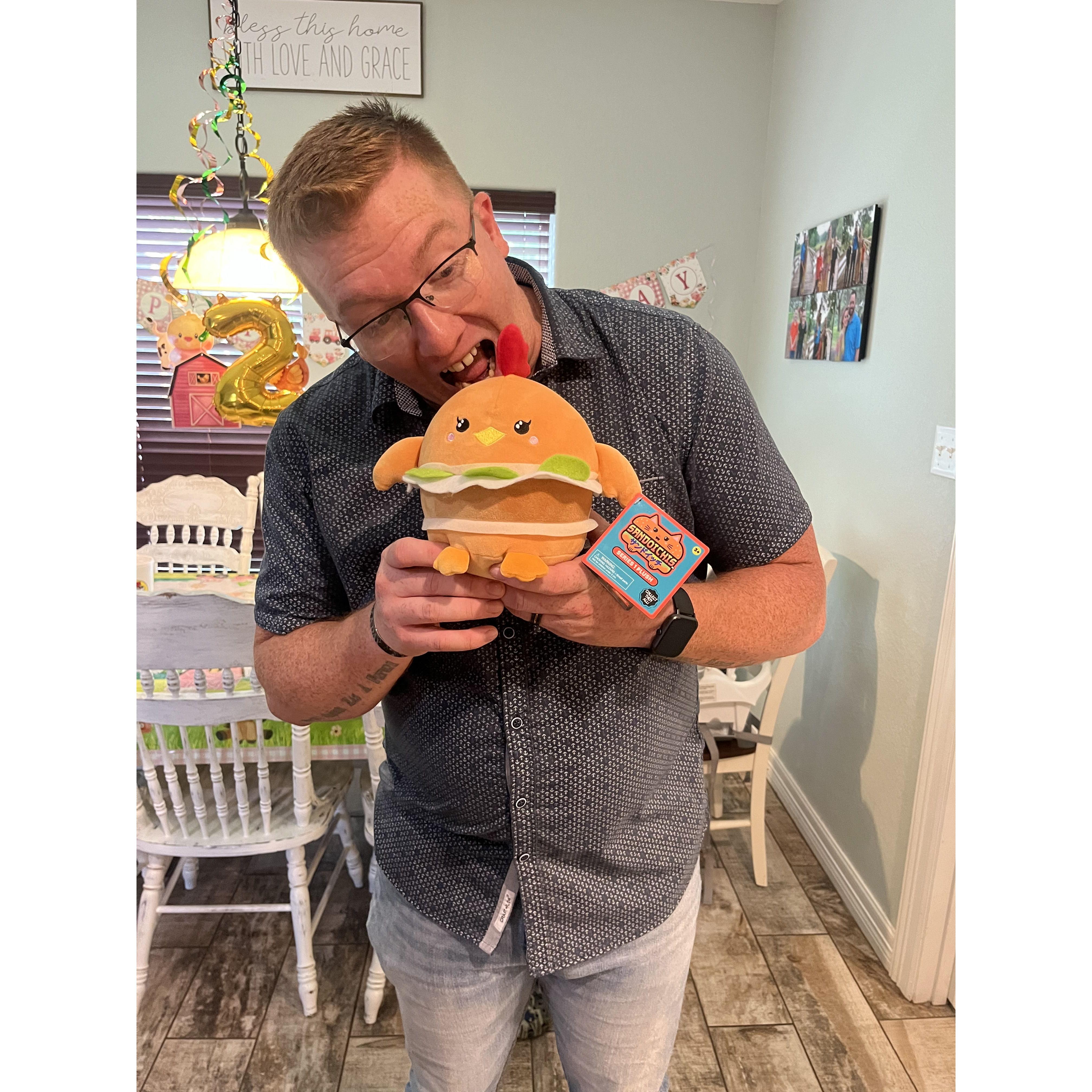Charles and our niece Sophia's birthday eating the "charlie the chicken" squishmallow we bought for her!😂😂