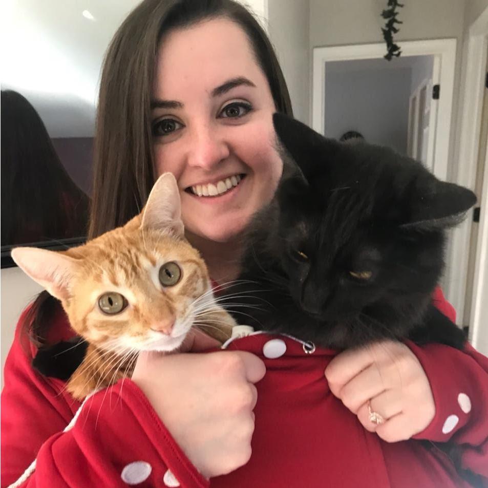 David got Brooke a sweater for Christmas with a pouch for the cats! (Dec 2017)