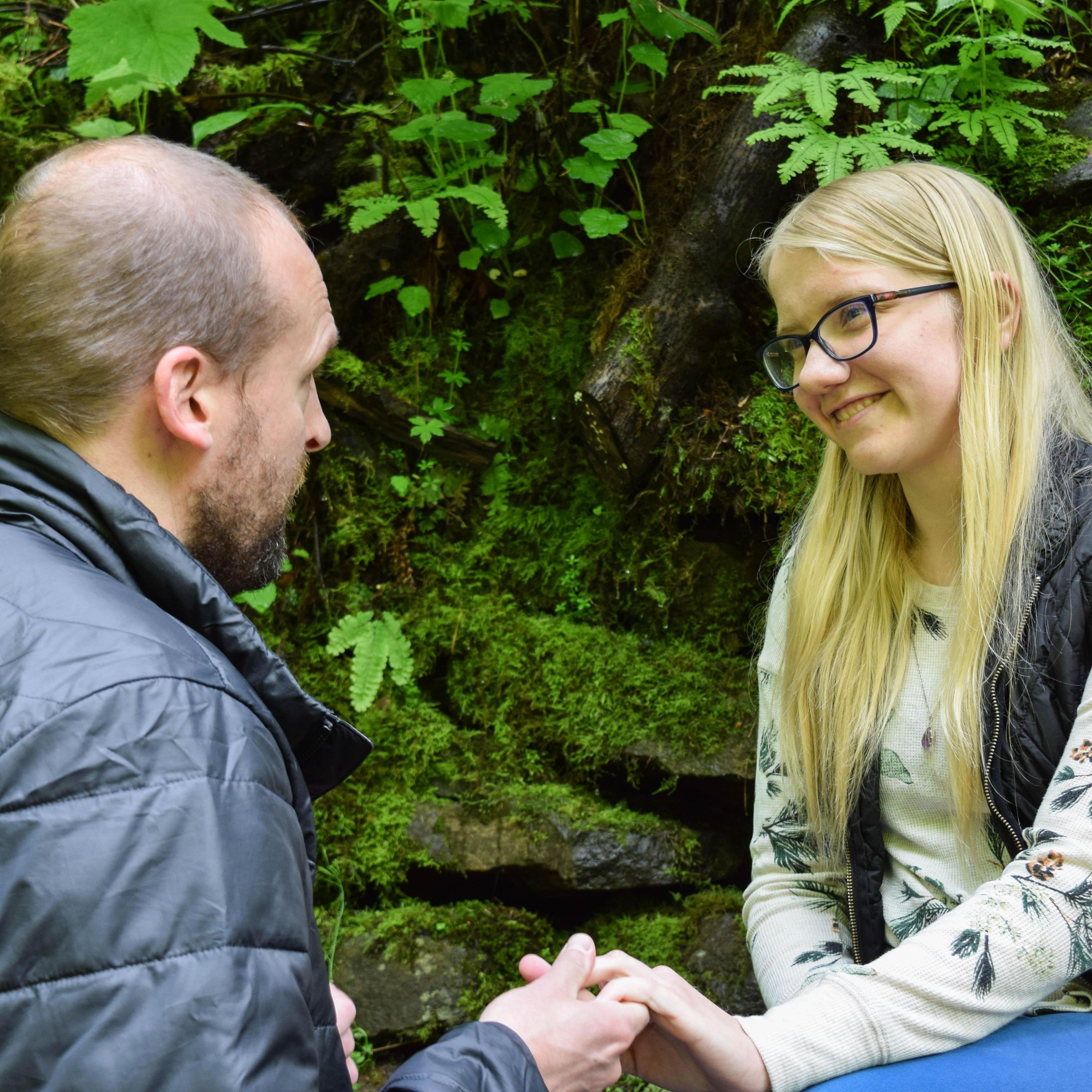 Maxwell getting down on one knee to ask Louisa to be his wife.