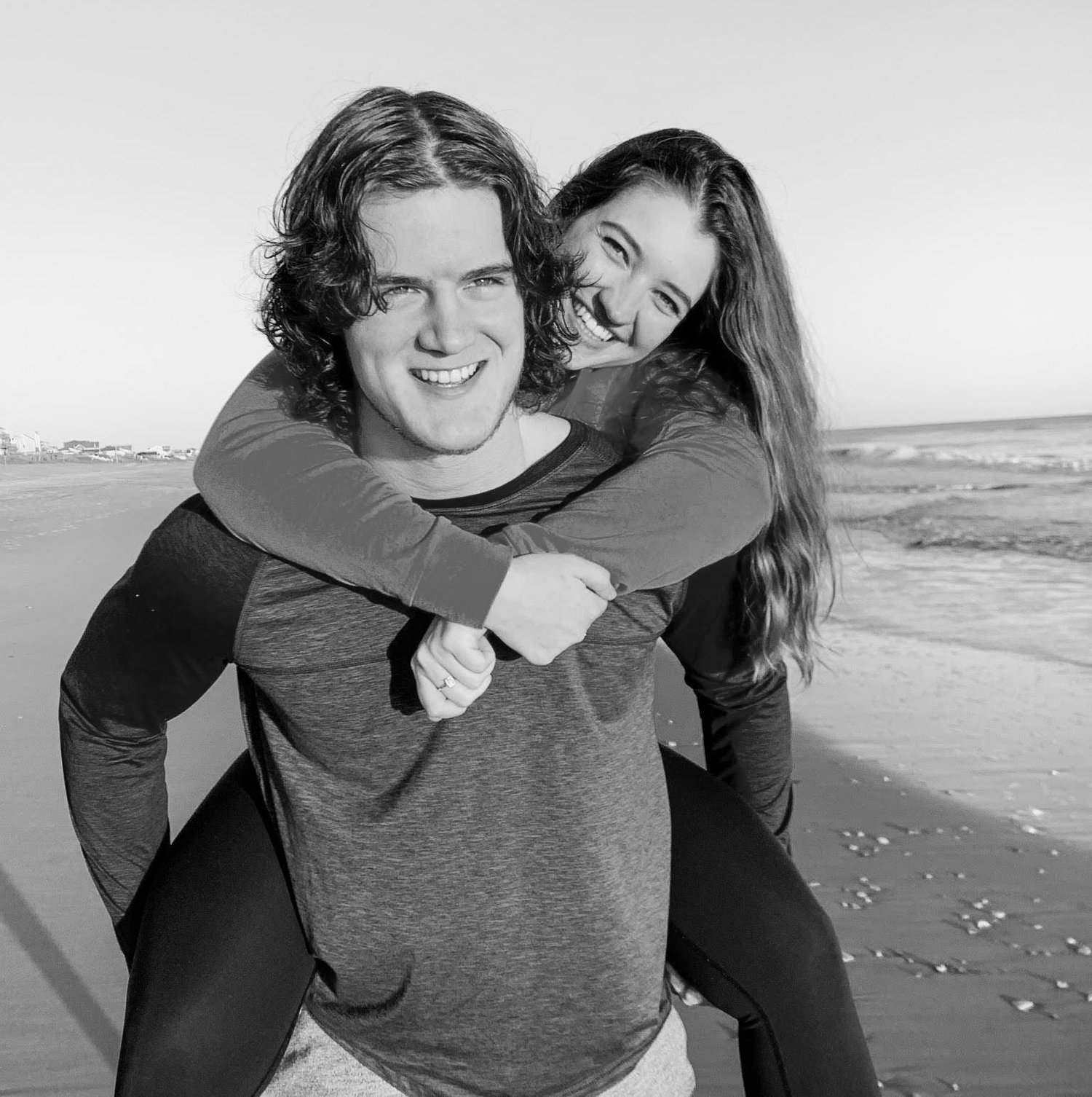 Our freshman year of college, during Rocky's "surfer hair" era!