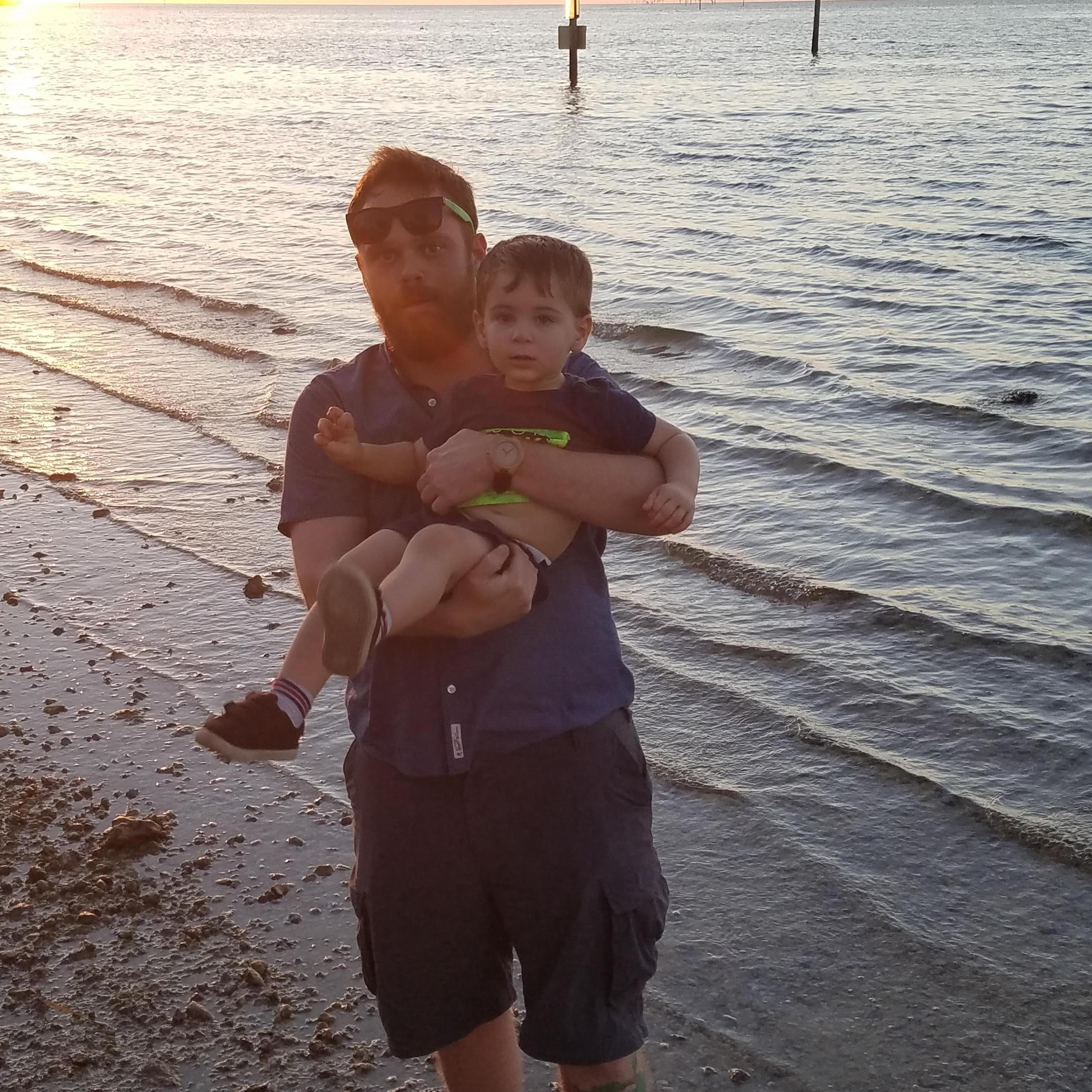Wes with our ring bearer, Barret, when he was a little babe!