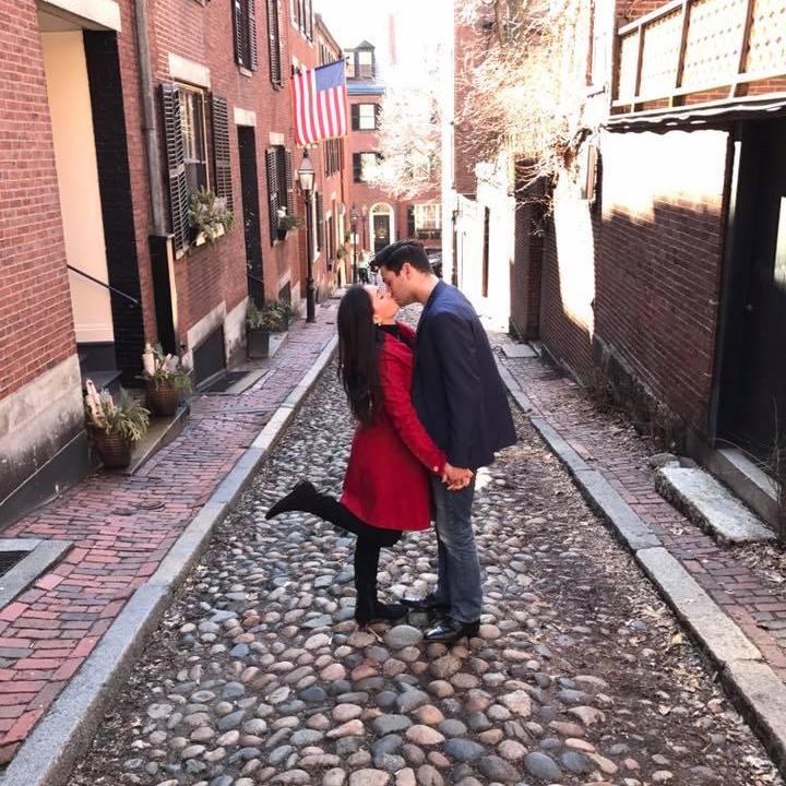 A romantic kiss in the city of Boston