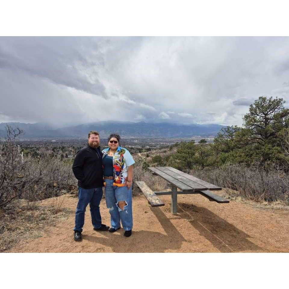Hiking with friends in CO and making him keep his eyes out for cool rocks to bring home