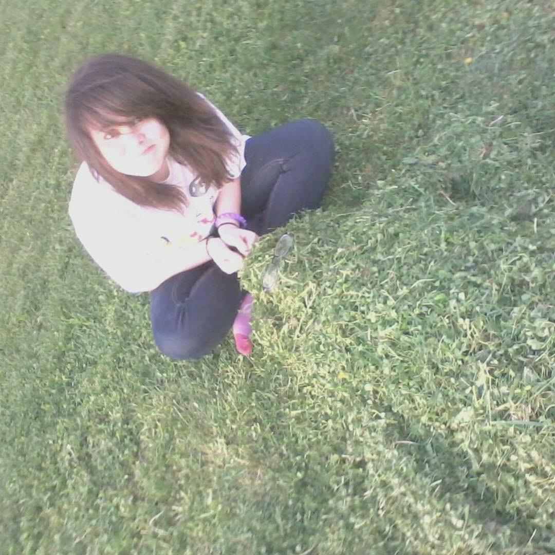 Our first ever photo together! Dj is buried in the grass, here. Circa 2012.