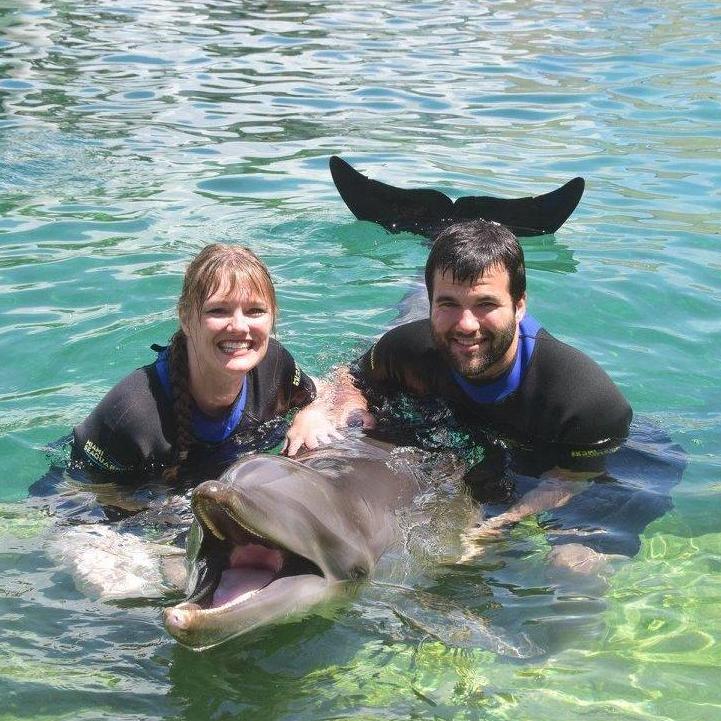 Swimming with dolphins at the Miami Seaquarium (thanks Papa Reis!)