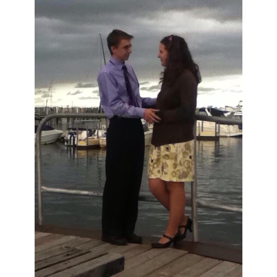 Our first family wedding we attended together, for one of my cousins. Went out to the lovely docks, and my mom snuck this photo.