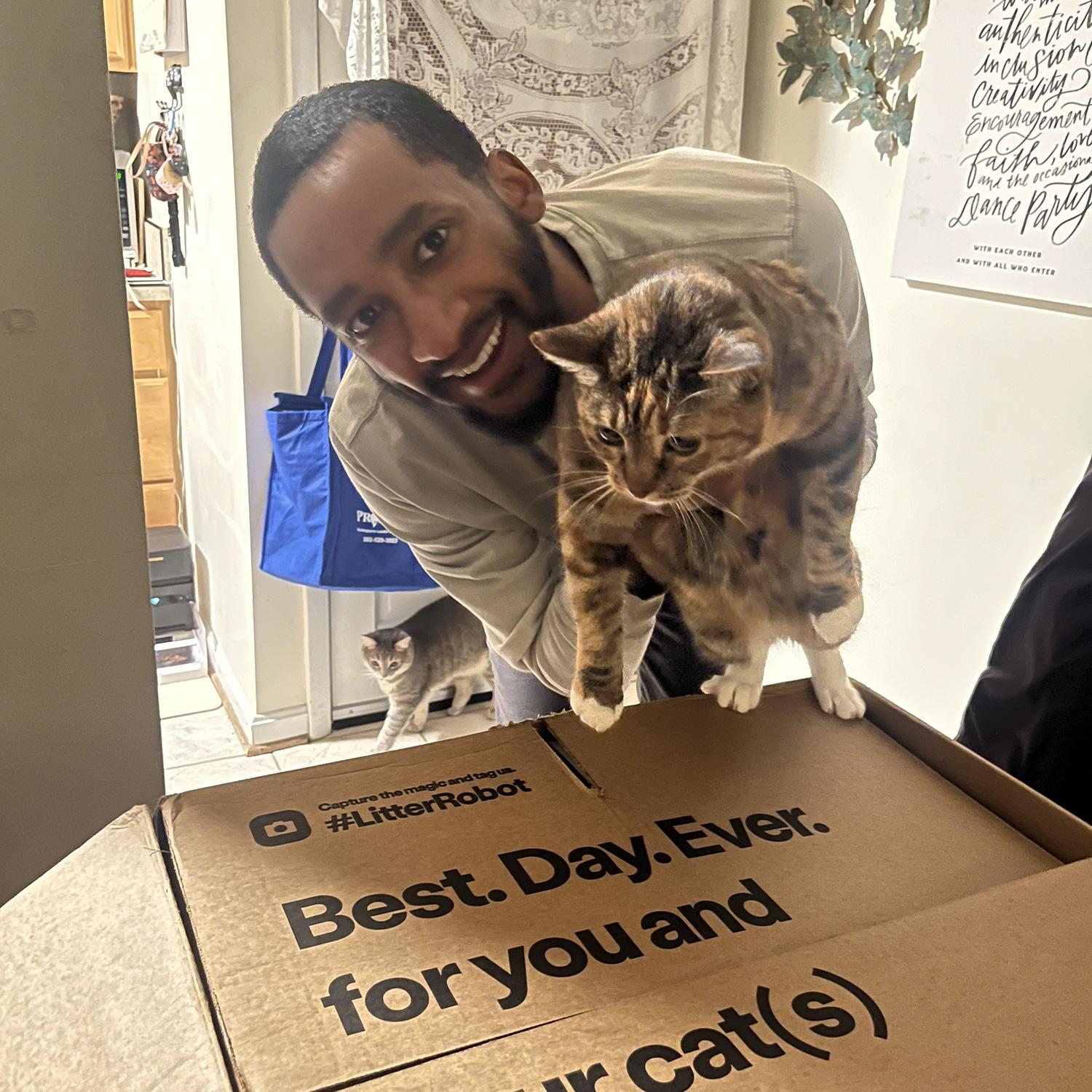 Photo proof Justin is now a cat person. Jenna’s mission in life is complete.