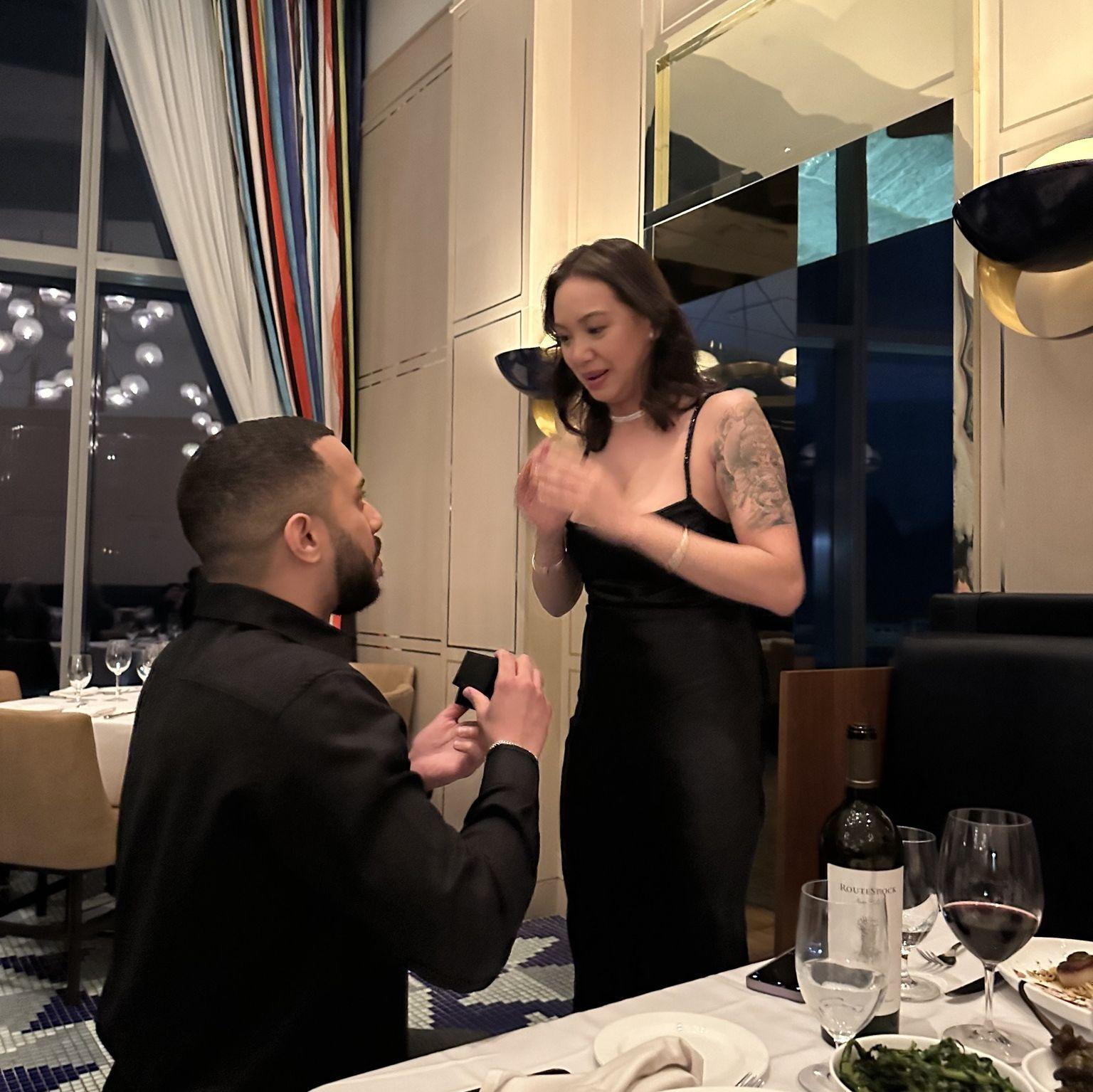 The moment Zach got down on one knee and asked Erica to marry him.