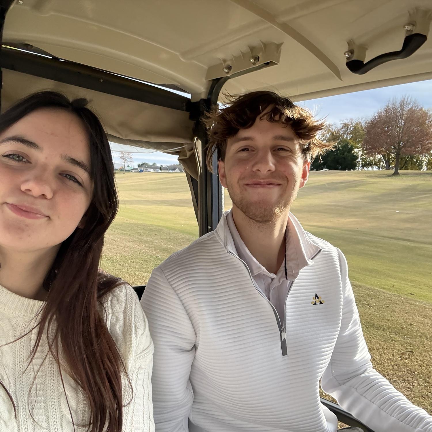 First time Heather was on a golf cart.