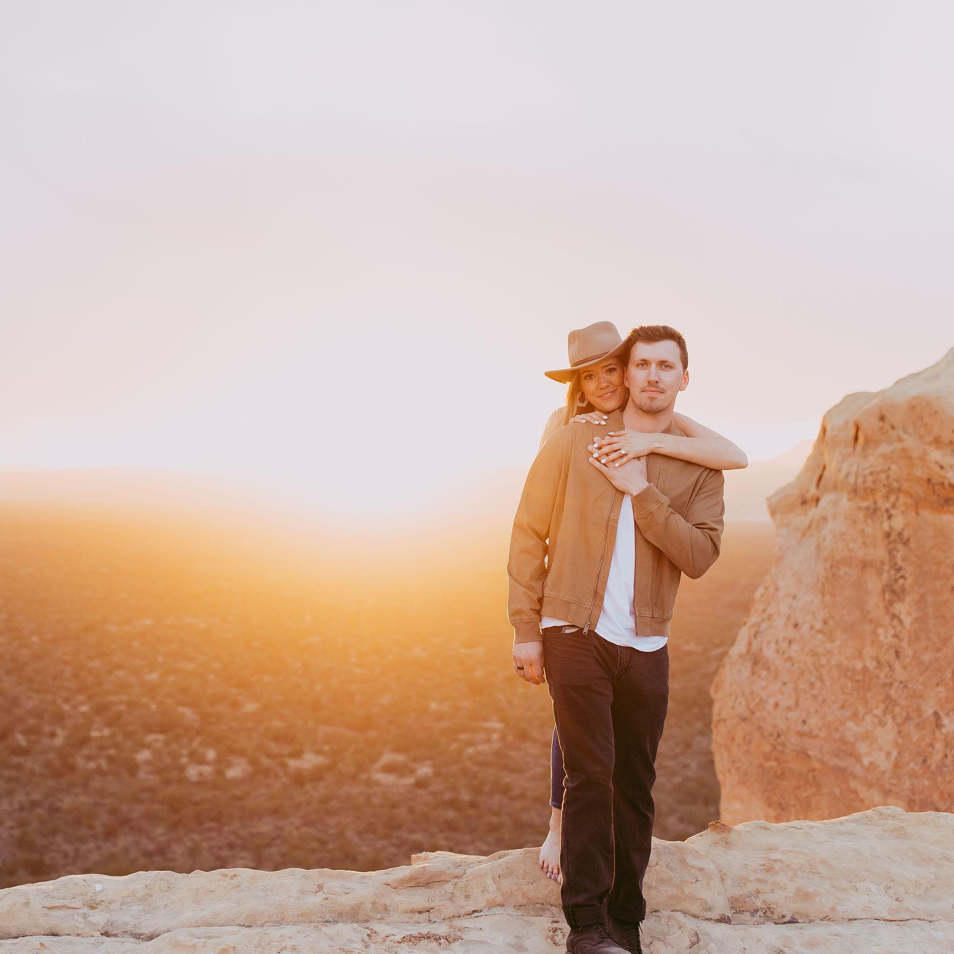 Engagement photos were taken by Ashley Shaw who is out of Albuquerque! Location was El Malpais National Monument!