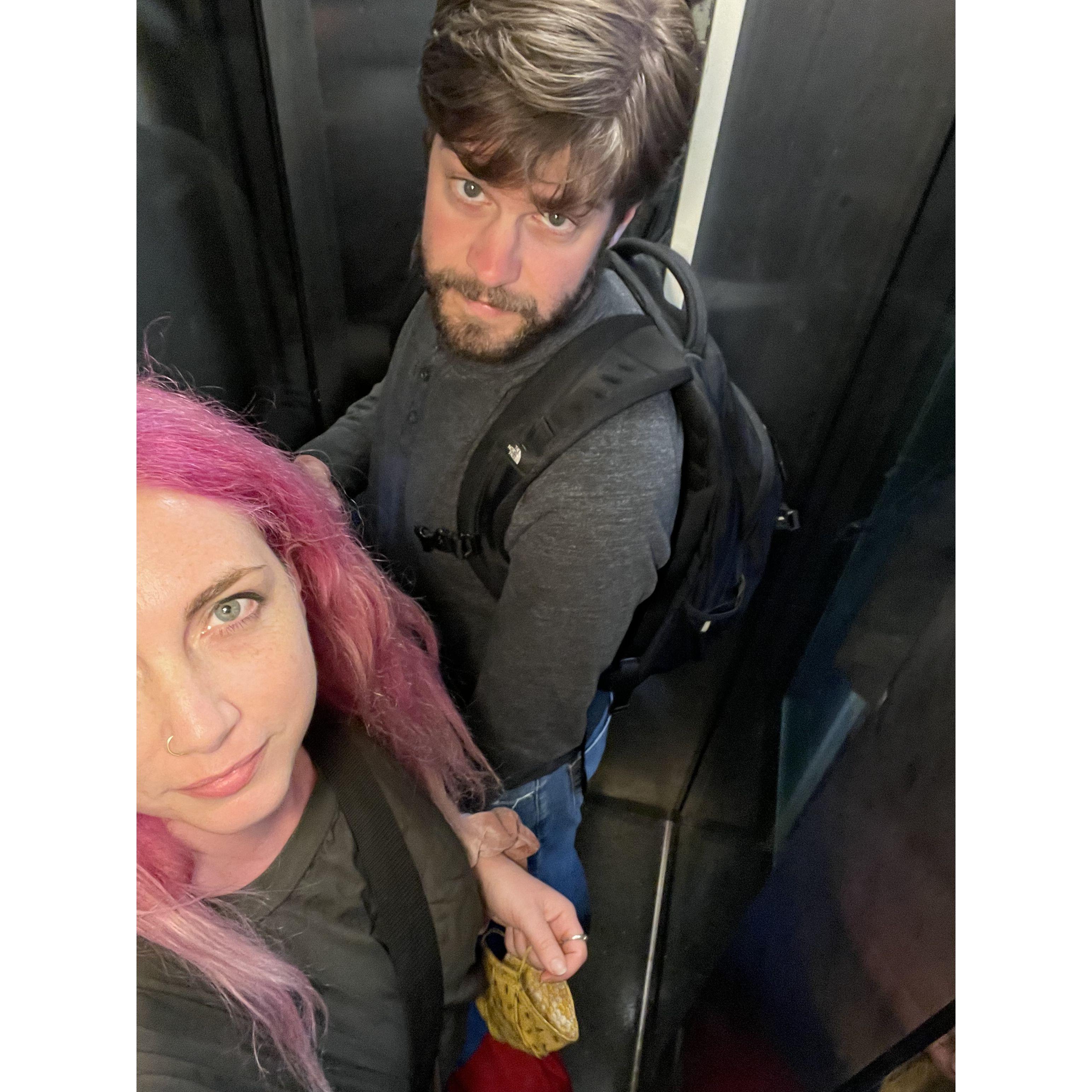 In a tiny Parisian elevator.