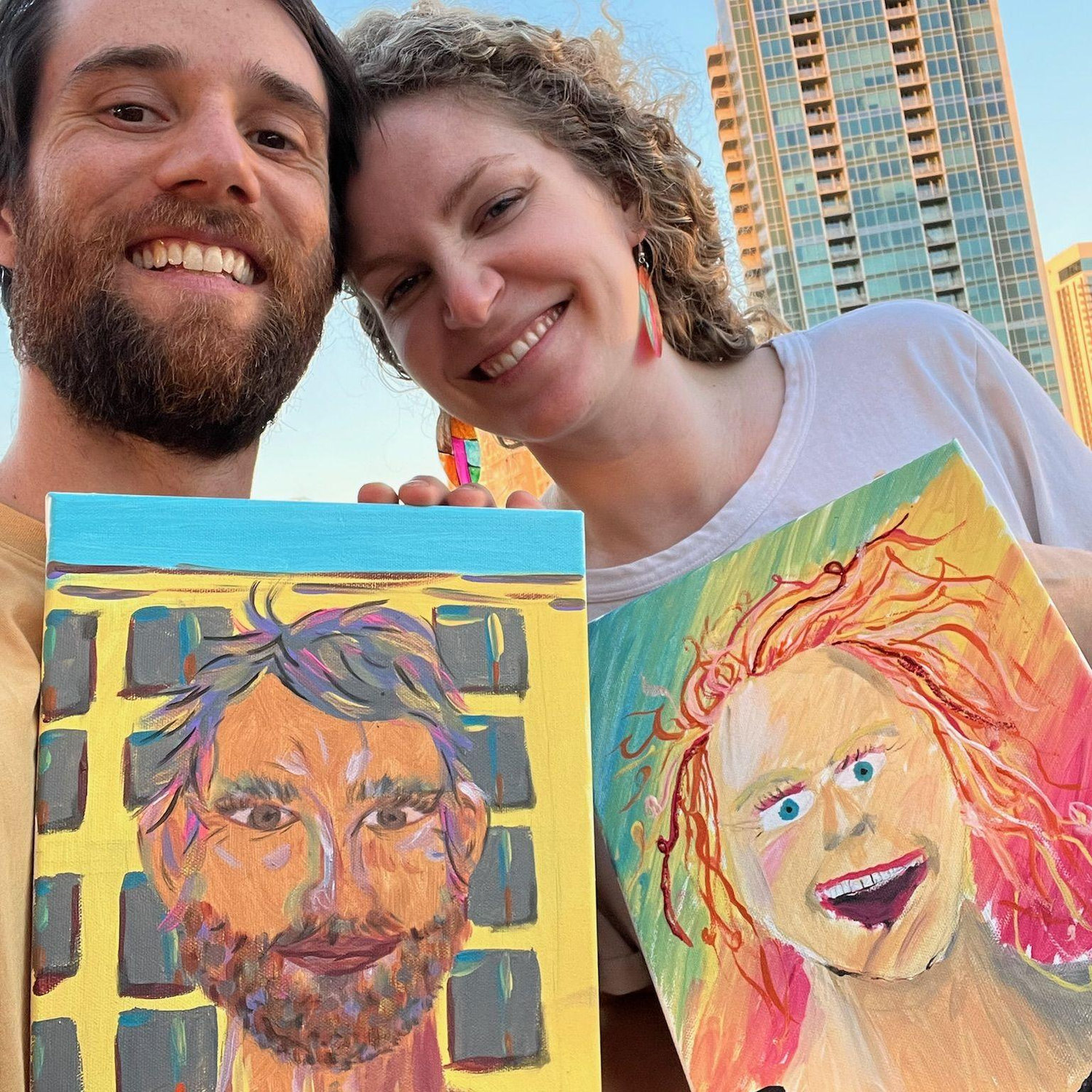 This summer, we had an artsy date full of giggles on a rooftop at sunset. Georgia painted a [decent] portrait of Nick. Nick painted a [horrifying] portrait of Georgia.