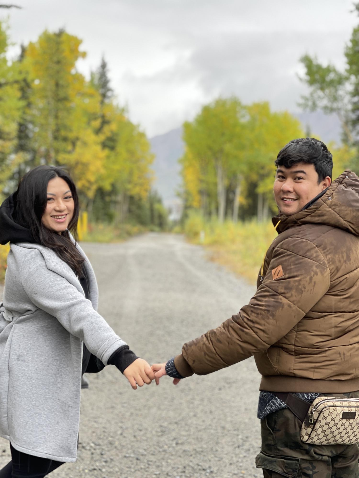 This photo was taken in Alaska, the night after our engagement. Practicing how to pose for photos. LOL