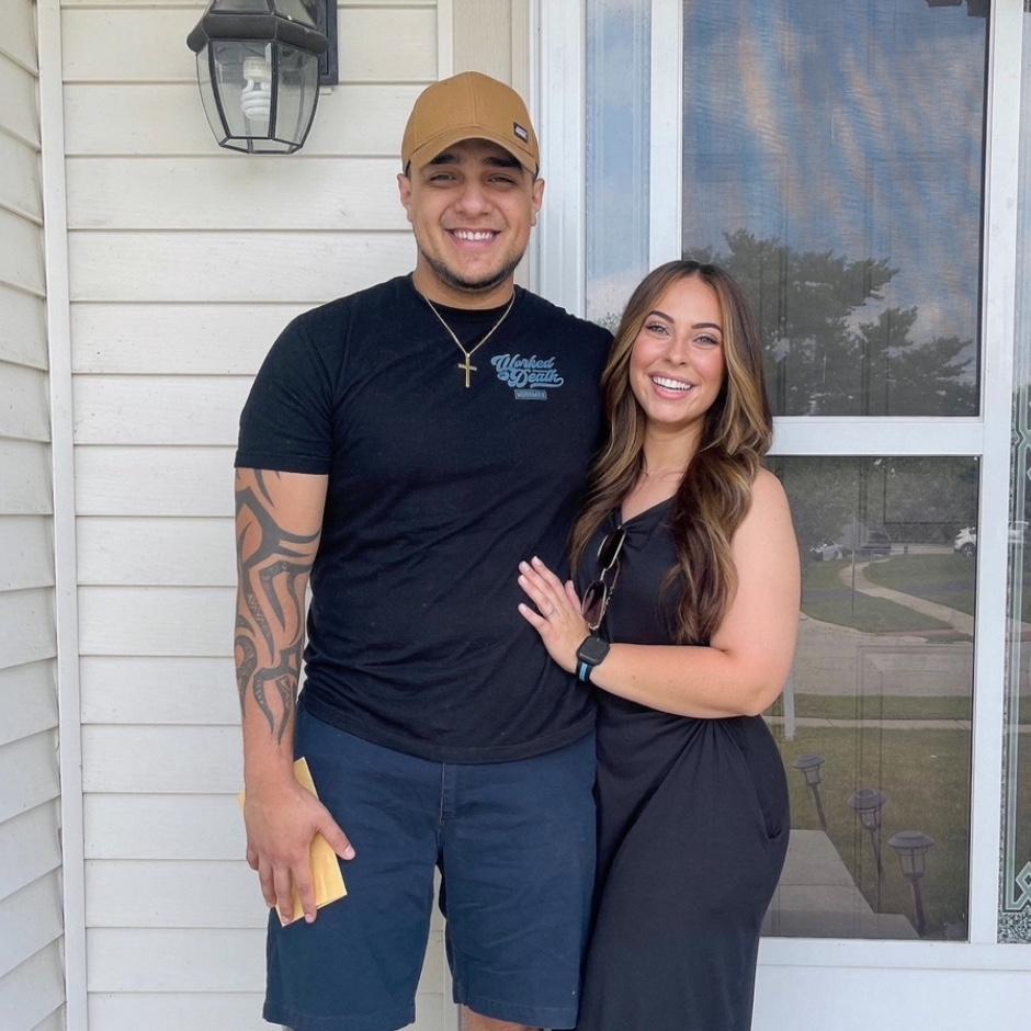 Our first photo in front of our new home!