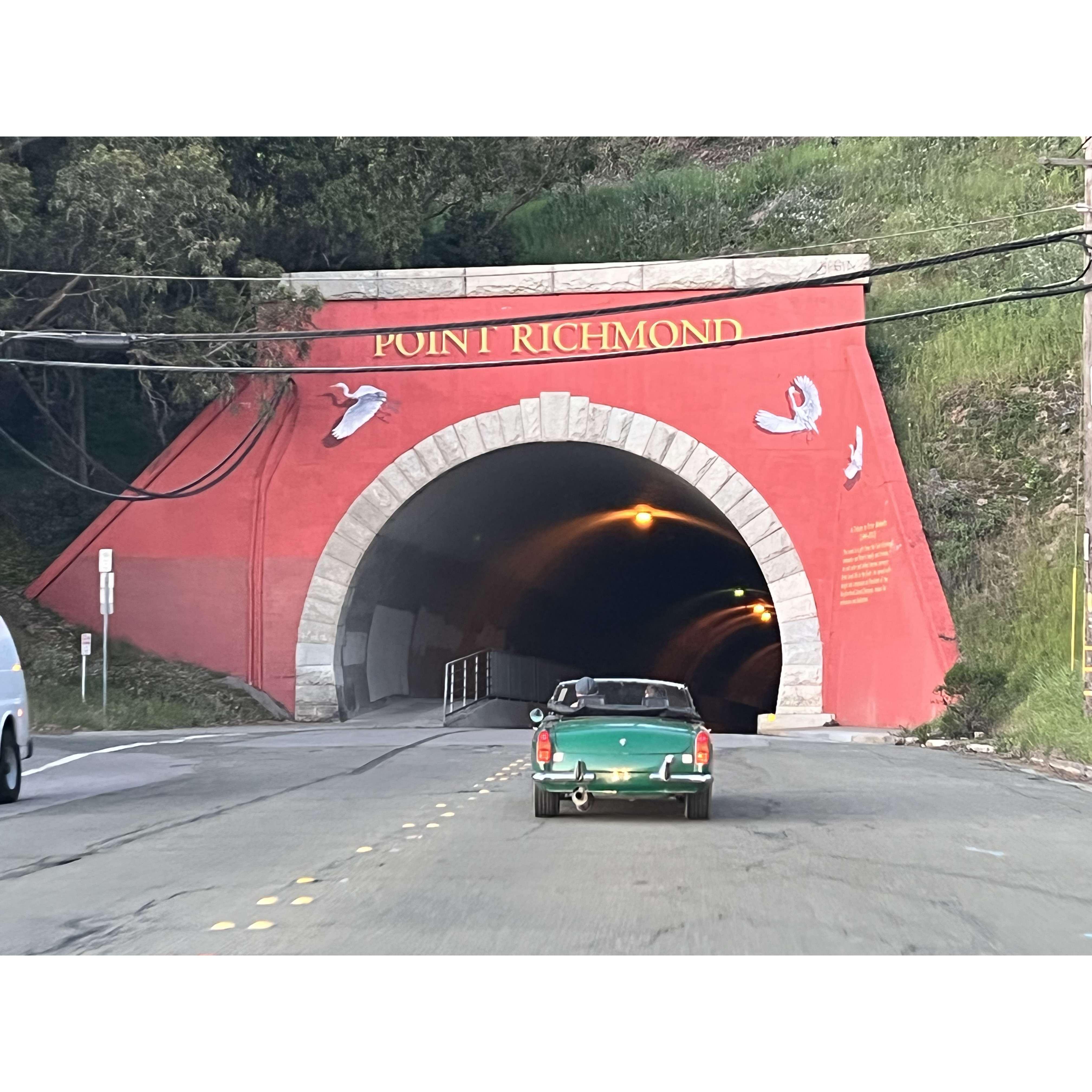 We tear through the tunnel and through our neighborhood in our little green machine!