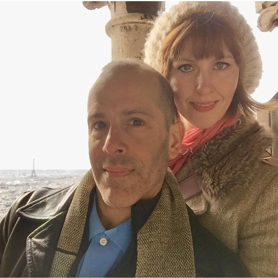 Atop all of Paris together.