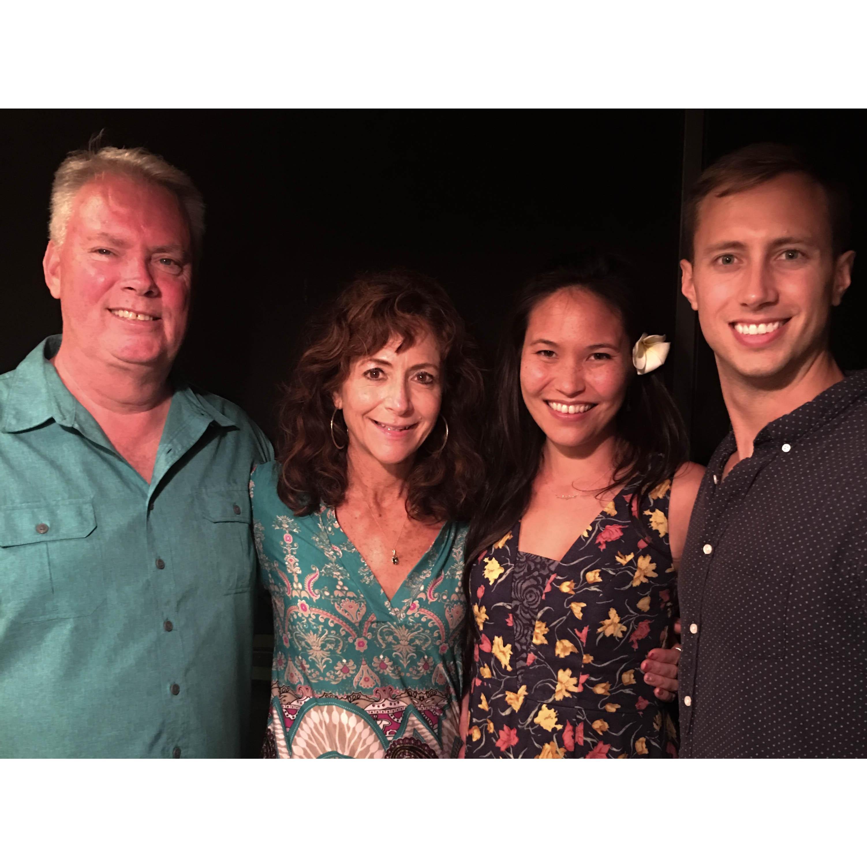 Zach's parents, Christy and Don Watson, with the newly engaged couple.