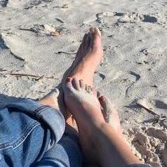 We love the beach!!  Even if he thinks chairs are OPTIONAL!!  LOL