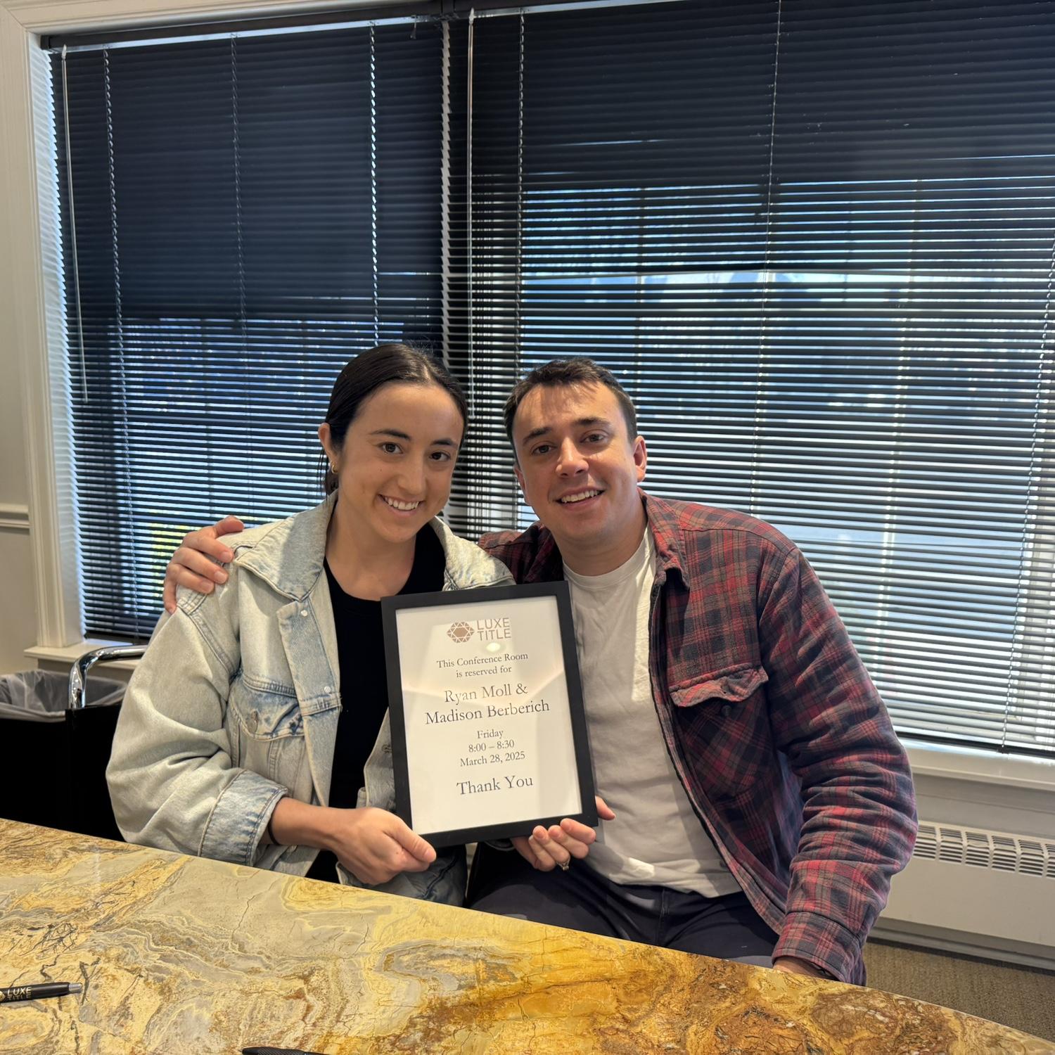 Signing the papers to our first home!!
