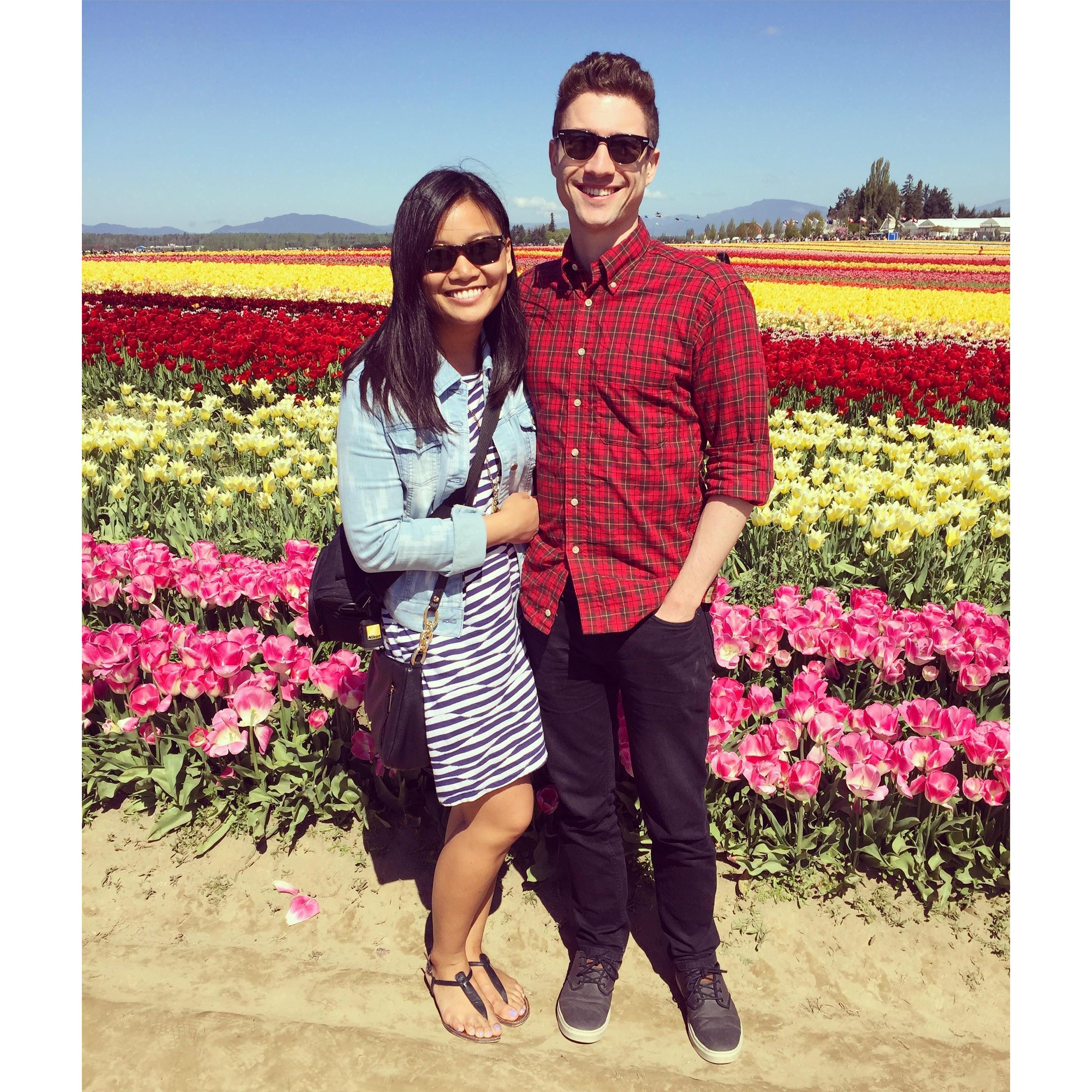One of our very first pics together after fighting traffic and crowds to get to the Skagit Valley tulip festival. April 2016.