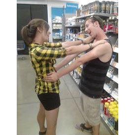 Practicing our slow dancing in Walmart while getting supplies to paint his junior year parking space.