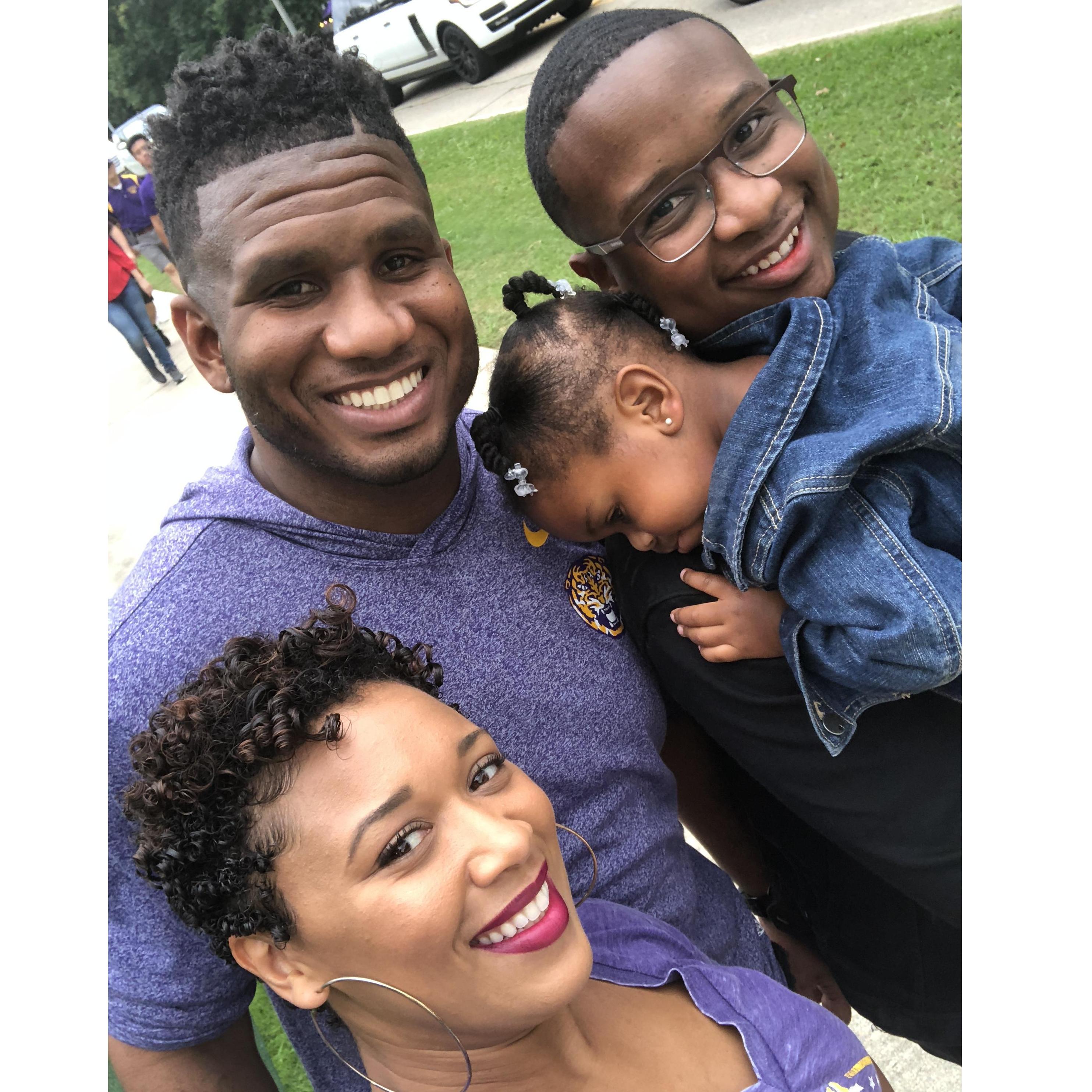 We continued the college homecoming tour with the Horton's & went to see LSU at Death Valley. These smiles were before we got rained on in the cold leaky stands, but Birk made sure to keep Casey dry.