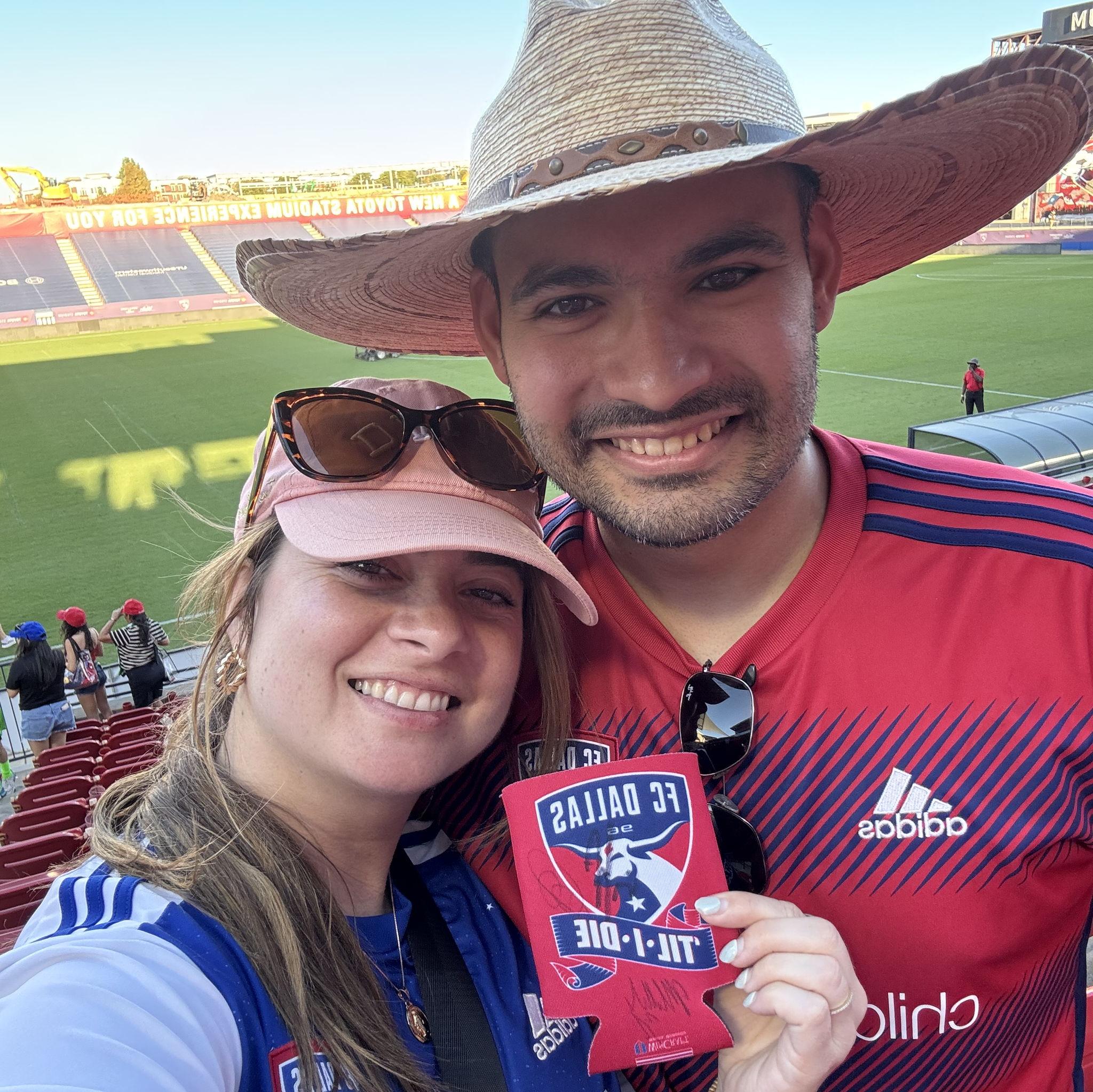 Two soccer lovers watching FC Dallas