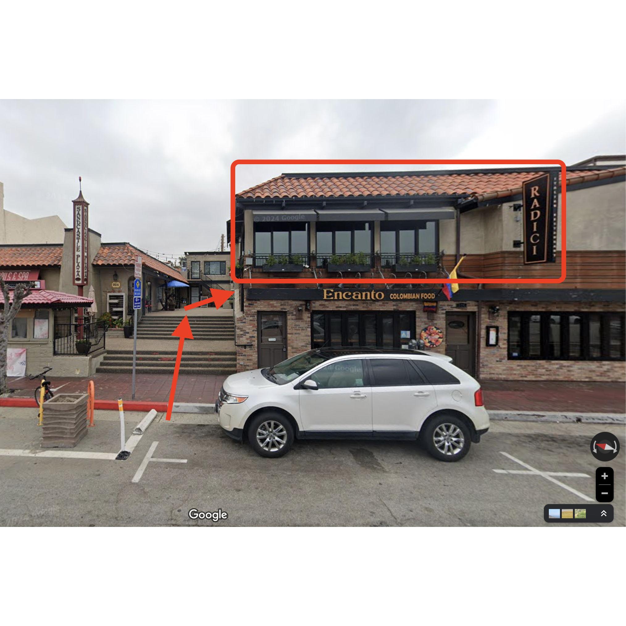 Here is the street view of when you arrive at Radici's address in Hermosa Beach. Go up the stairs and turn right.