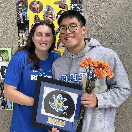 Sydney attends Connor's senior meet at Rollins in January 2023