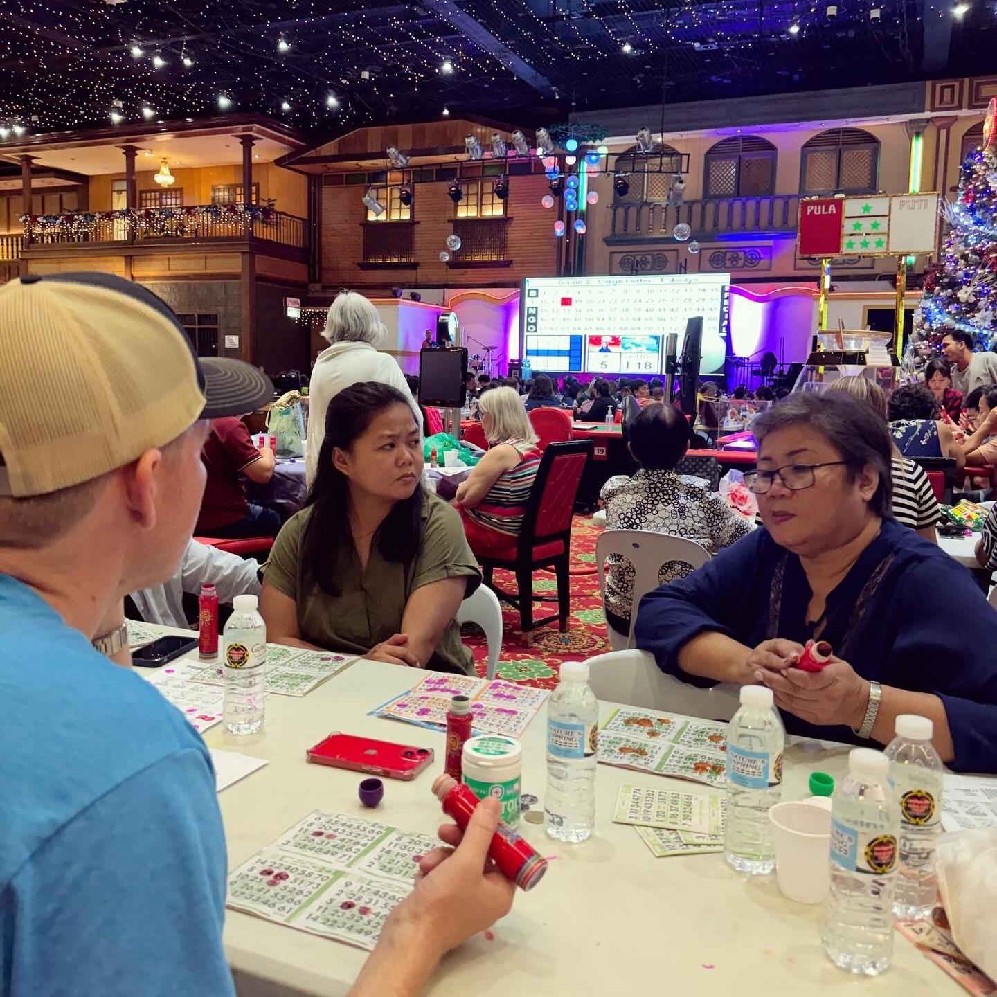 Eric playing bingo with Mitch's mom