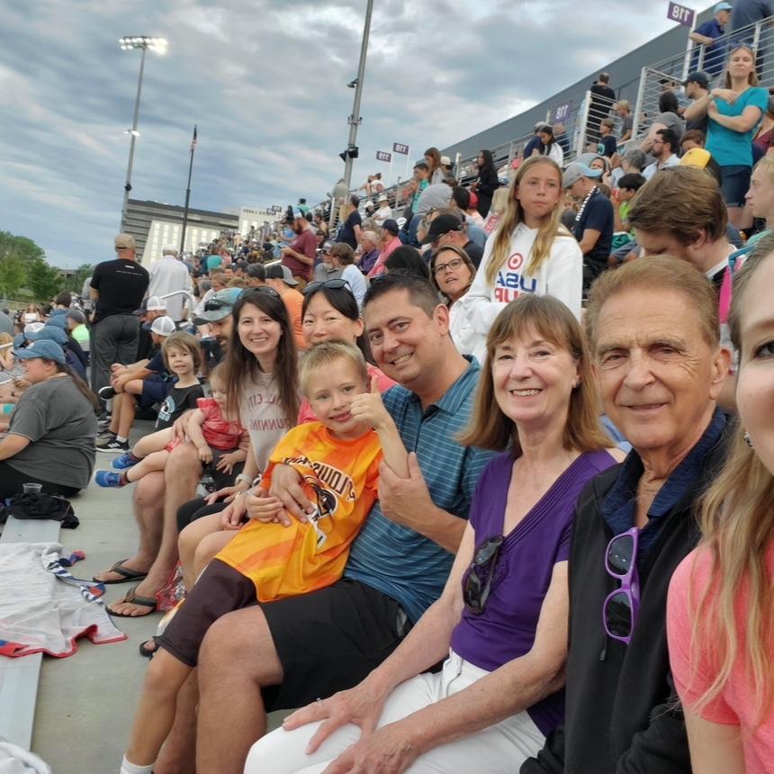 Ashley and her family at a Minnesota Aurora game.