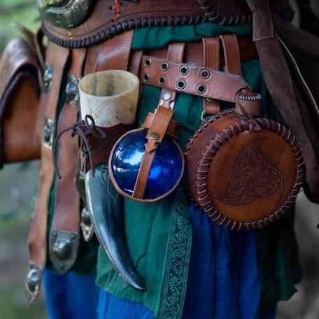 Leather elements are a fantastic way to achieve that dungeons and dragons adventurer feel; especially if you are carrying potion bottles, a drinking horn, or a water gourd.