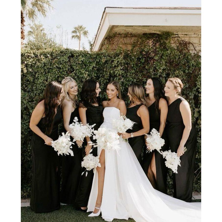 The bride’s ladies dressed in all-black – chic, elegant, and coordinated to perfection.