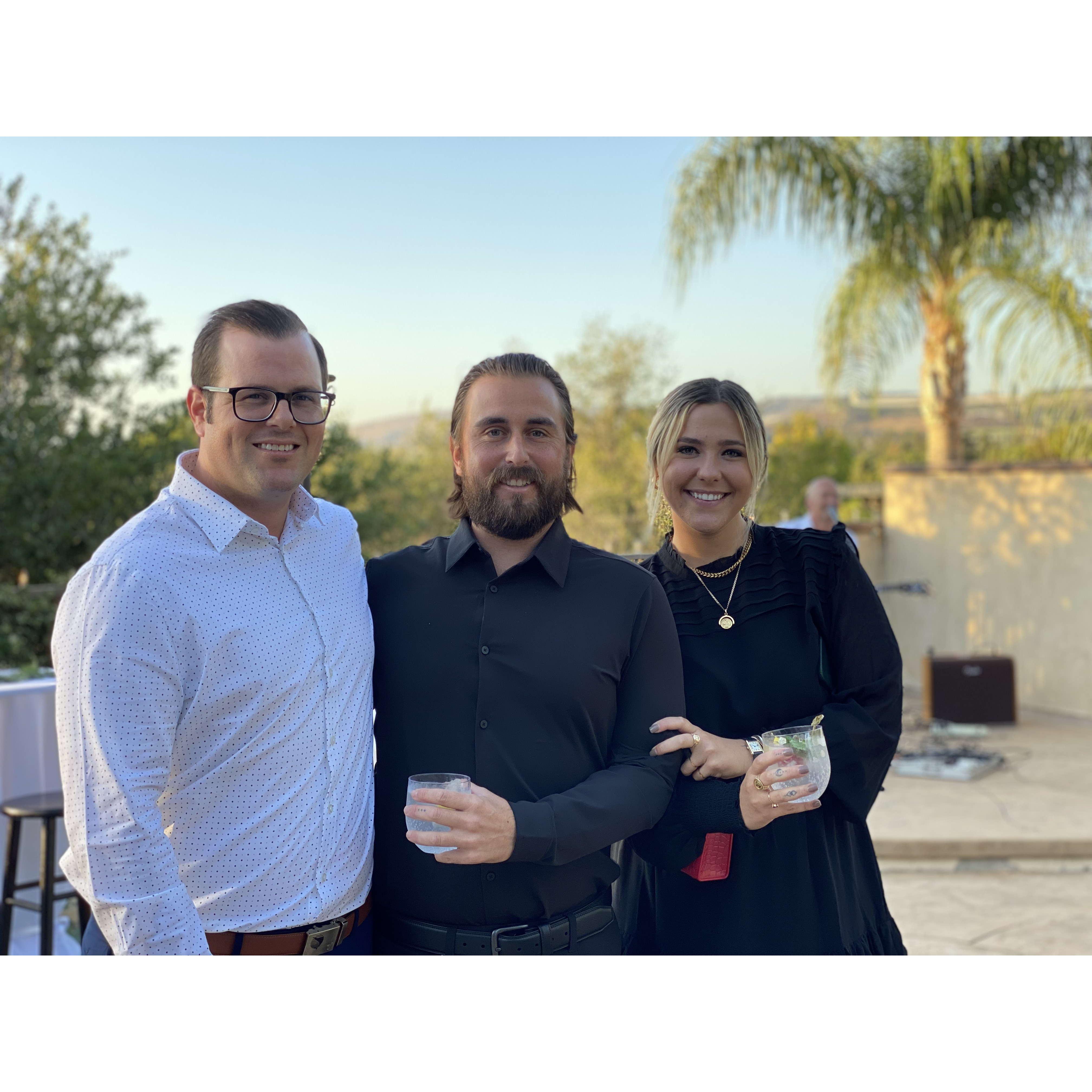 At the engagement party with Tyler (groomsman) and Emma