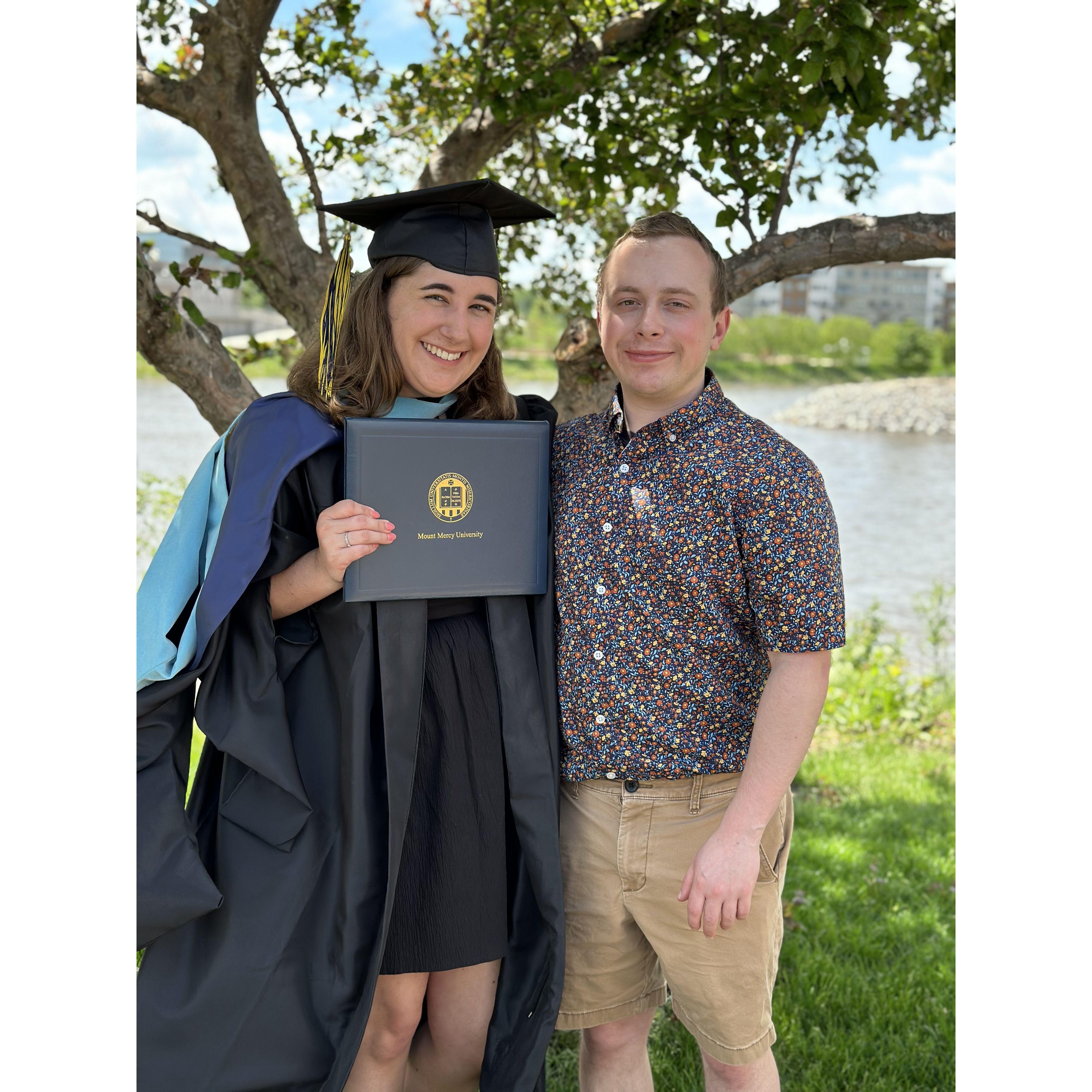 Claire graduates with her master's degree, also the first time both families met! Cedar Rapids, IA Spring 2024.