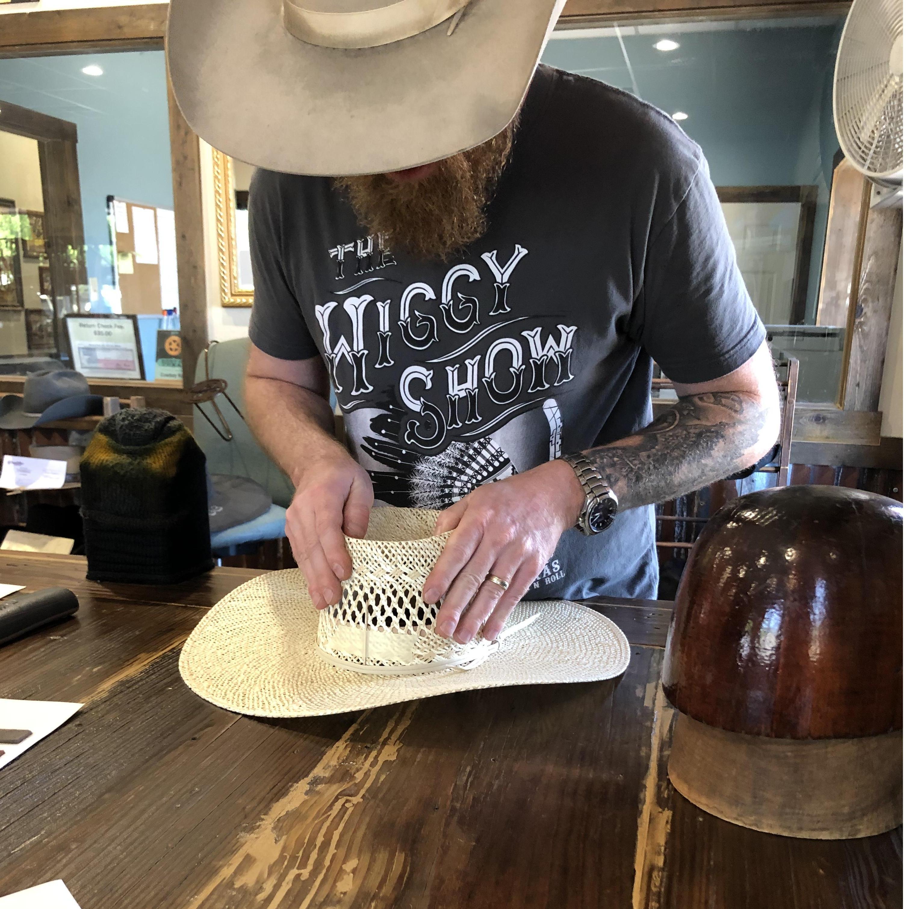 4/26/19 the owner of Standard Hat Works shaping Byron’s hat for our engagement pictures!