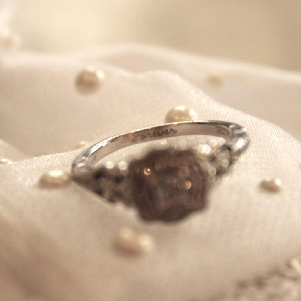 He had the ring engraved with Forever