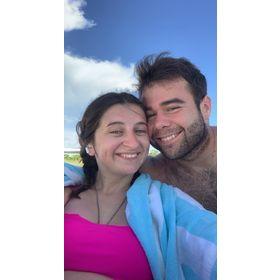 This is us roasting in the sun because we both forgot to put on sunscreen at the beach.
