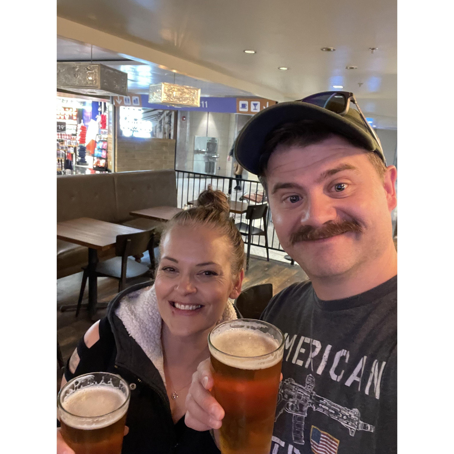 0500 Beers at the airport before our flight to California for Darlene's Birthday.