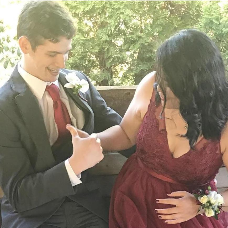 Our senior prom (and yes, we are thumb wrestling)
