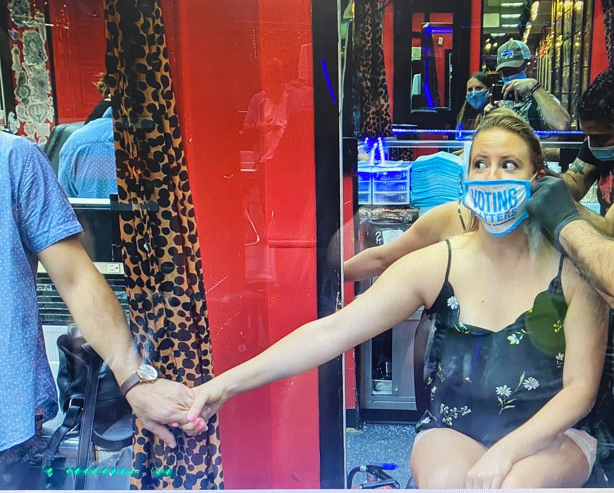 Lara gets her ears pierced (and Steve’s supporting hand). NYC. 2020.