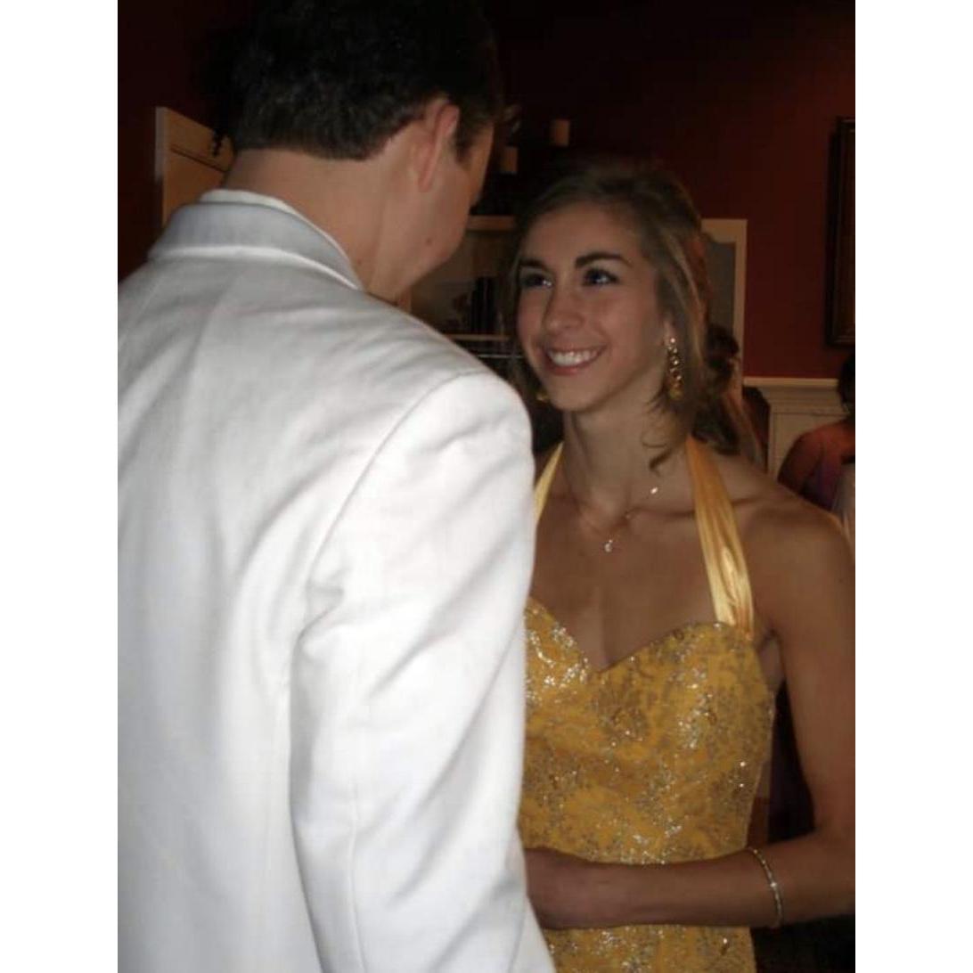 Senior year prom. Stian insisted on wearing a white tux and getting a cane. He tried to complete the Colonel Sanders look with a top hat, but I had to draw the line somewhere.