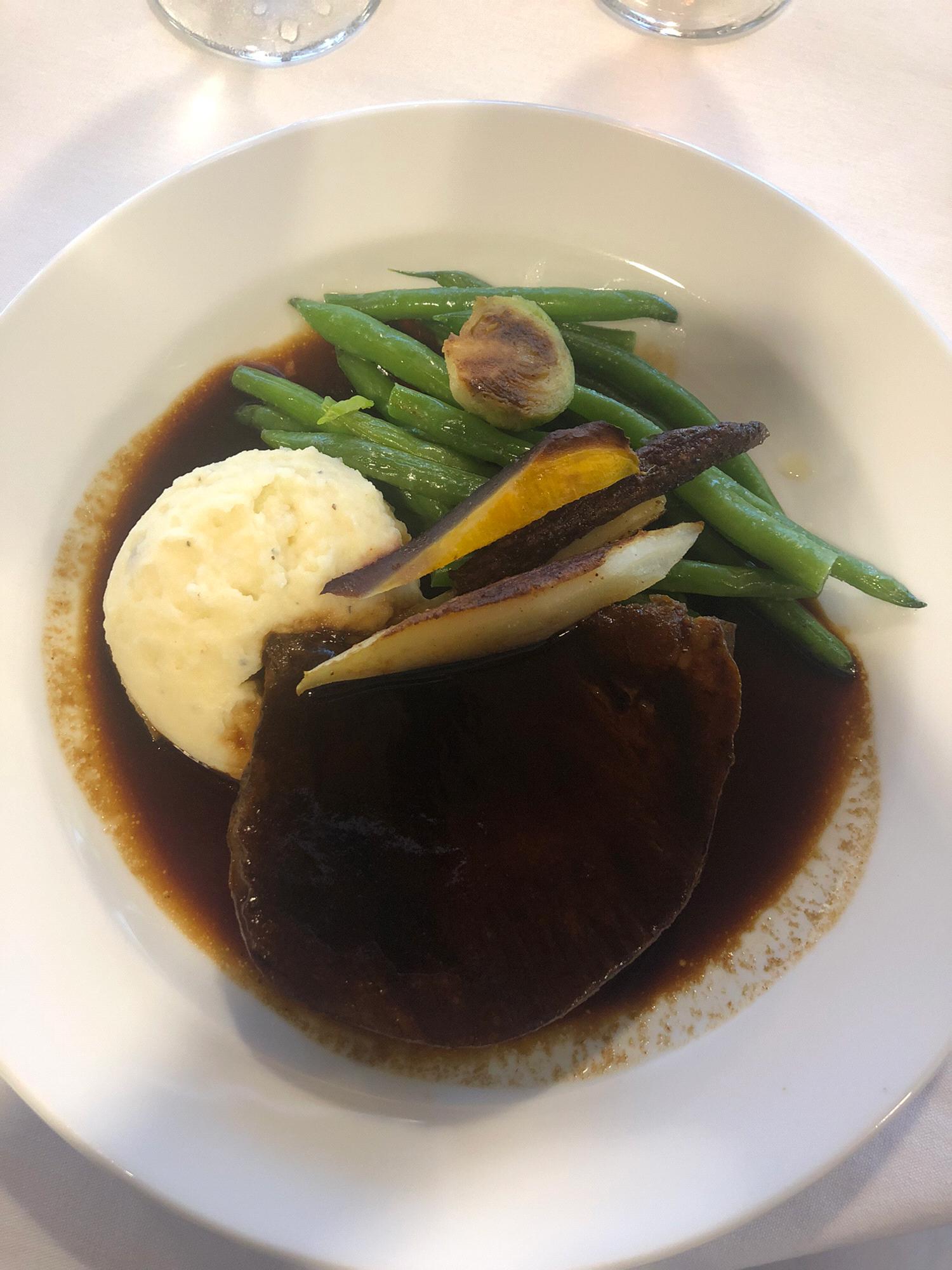 Burgundy Braised Beef: 
slowly simmered in burgundy wine served with white cheddar mashed potatoes and green beans