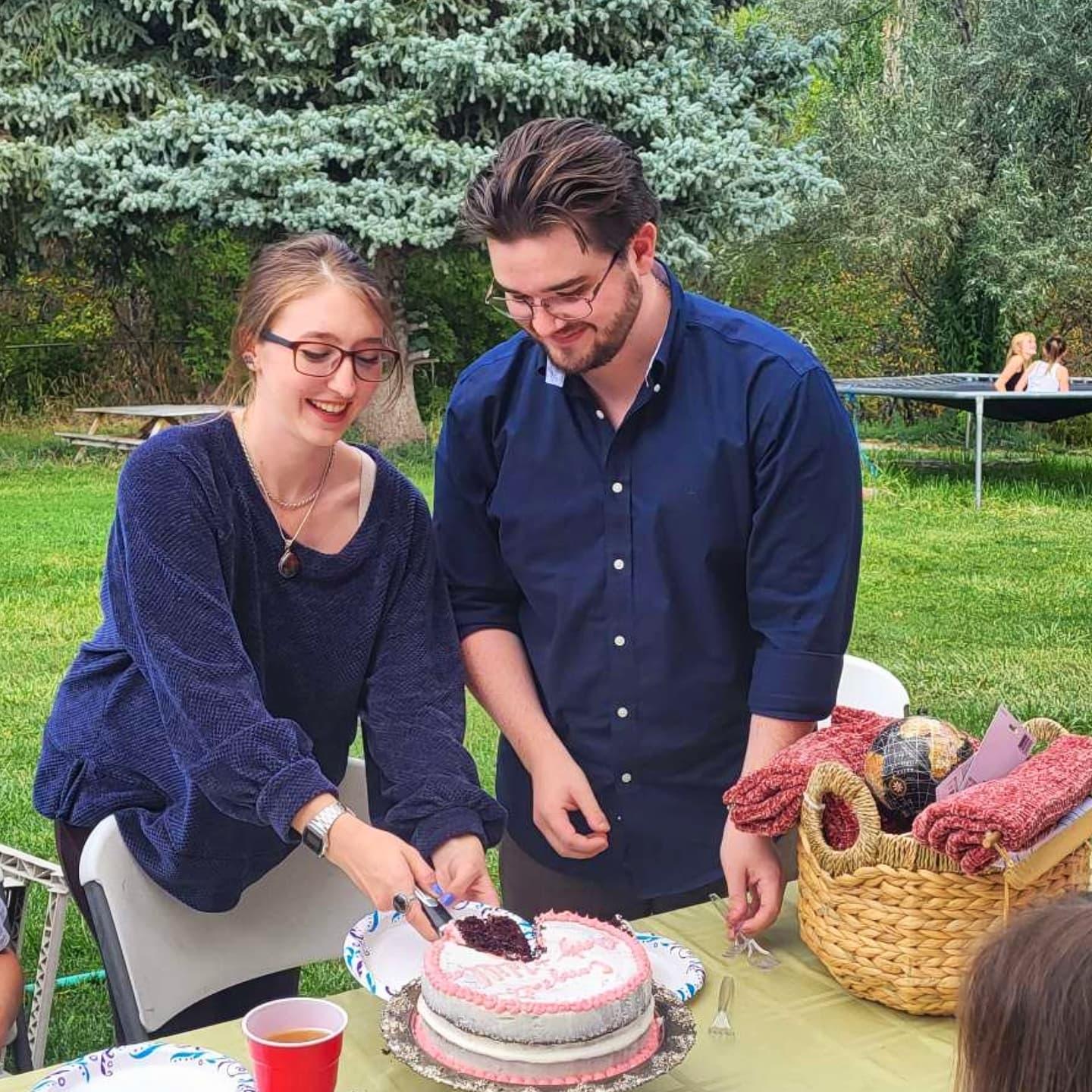 Cutting the cake that Andy's lovely cousins made for us at an engagement party, thrown by Stacey & Matt's family.