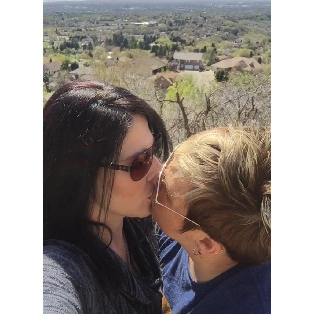 Stealing a kiss while we went hiking and looked out over the city.