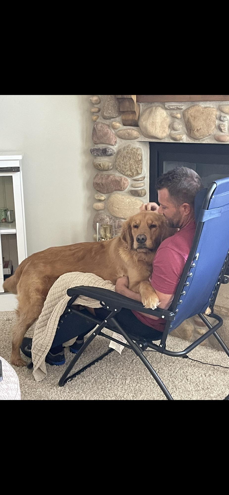 Do not let him tell you that he doesn't love golden retrievers